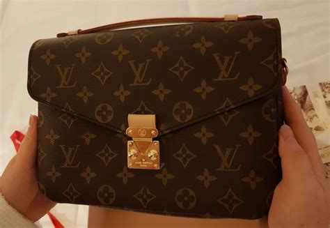 como saber si una cartera es original louis vuitton|authentic louis vuitton purses.